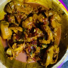 A bowl of spicy and delicious chicken gizzard. This is a popular side dish, perfect for those who love a bit of heat.