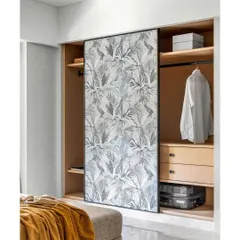 A clever use of our wallpaper by Parikh and Associates. A tropical leaf print transforms a simple sliding wardrobe door into a stylish feature, proving that our designs can be used in creative and unexpected ways.