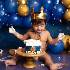 A cake fit for a little king! This royal-themed cake smash was all about celebrating his first year with playful mess and majestic fun. I love capturing the pure delight as they dig in for the first time.
