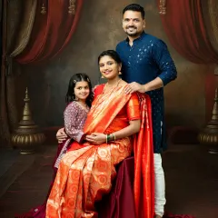 I love creating timeless family portraits that honor our culture. Here, the entire family comes together in traditional attire for a regal and warm maternity photo, celebrating the new life that will soon join them.