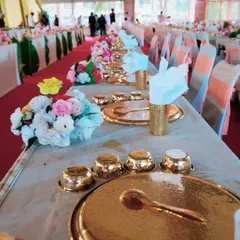 For religious functions, I offer traditional Pangat Seva. Each guest is honored with a beautifully set golden thali, creating a truly authentic and respectful dining experience.