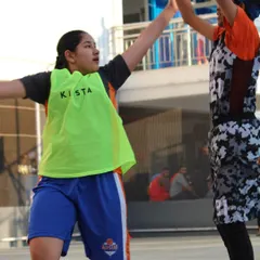 Playing tough defense during a girls' basketball game. We teach our players the importance of hard work on both ends of the floor, building the confidence that comes from being fully prepared.