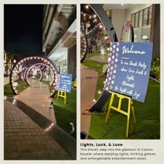 The entrance to our Casino Royale Diwali party, featuring a welcoming sign and a tunnel of glowing arches. This setup created an immediate sense of excitement and festive glamour for arriving guests.