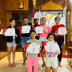 A group of my young students proudly holding their certificates after completing a dance course. It is rewarding to see them achieve their goals.