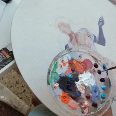 Sometimes the best studio is the one with a fresh breeze. Here I am working on a canvas painting in my balcony, with my paint palette ready to go. The natural light is perfect for mixing accurate colors.