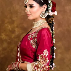 A side view of this intricate floral braid. The hairstyle is both traditional and incredibly photogenic.