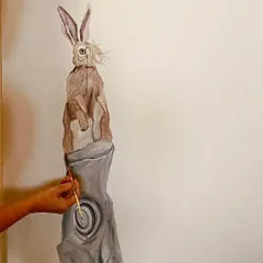 The process of painting a curious rabbit for a child's room mural. I enjoy creating these friendly characters that add a storybook feel to the space.