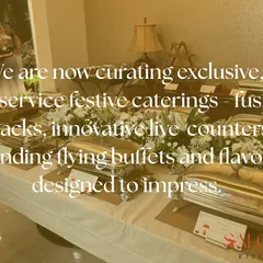 A full-service festive catering setup. This image shows a classic buffet line with silver chafing dishes, ready to serve a menu of fusion snacks and innovative dishes designed to impress.