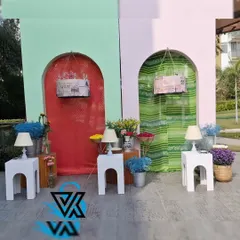 Another angle of the multi-colored Haldi photo booth, showcasing the playful mix of textures and colors that encourage guests to interact and take pictures.