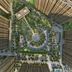 A top-down view of Casagrand Sun City reveals the geometric precision of the Roman-inspired landscape design, with a grand central plaza and manicured gardens creating a formal, organized community layout.