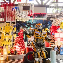 Autobots, roll out! This Transformers-themed birthday party was an action-packed celebration, complete with a life-sized Bumblebee character and industrial-style decor. I thrive on bringing these larger-than-life characters and worlds to your child's party.