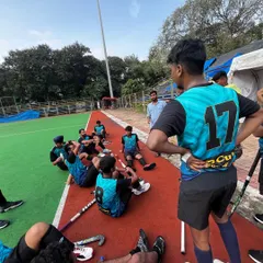 A player from our PCube Flamingos squad takes a moment to rest on the sidelines. The intensity of tournament play requires every player to be in peak physical and mental condition.