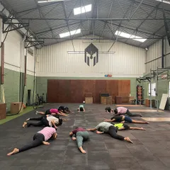 Warming up is key! We guide our climbers through essential stretches and movements to prepare their bodies for climbing and prevent injuries.