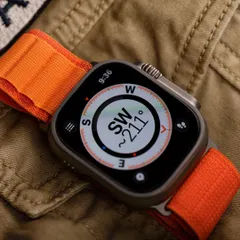 This lifestyle shot for the Apple Watch Ultra places the product in its intended environment. By showcasing the compass feature against an adventurous, textured background, we tell a story of utility and ruggedness that a simple studio shot cannot.
