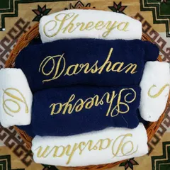 I love this sophisticated color combination. This trousseau hamper for 'Shreeya' and 'Darshan' uses deep navy blue and crisp white towels, all embroidered with an elegant gold script. The contrast is just beautiful.