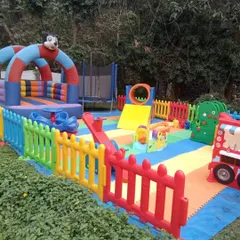 Here is a complete outdoor activity center featuring a bouncy castle, a trampoline for extra jumping fun, and a play structure with a slide. I ensure every piece of equipment is sturdy and from top international brands for safe, reliable play.
