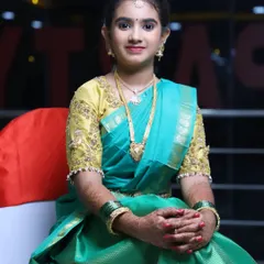 Niharika looking lovely for her half-saree function. The makeup is kept light and fresh, perfect for a young girl on her special day.