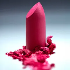 An experimental shot focusing on the texture of a matte pink lipstick. By crumbling the product at the base, I could highlight its powdery, rich pigment in a visually interesting way.