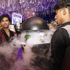 Here’s a glimpse of our molecular bar service in action. A server presents a drink under a dome filled with smoke, creating an aromatic and visual reveal that elevates the simple act of receiving a cocktail.