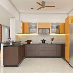 We integrated a breakfast counter into this U-shaped kitchen to connect it with the main living space. It provides a casual seating area while maintaining a clear view of the entire open-plan room.
