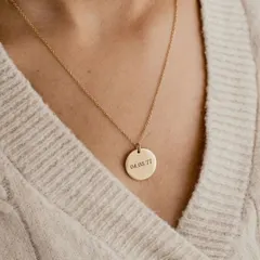 Keep a significant date close with this engraved round pendant. This piece is customized with a special date, making it a perfect anniversary gift or a memento of a life-changing day.