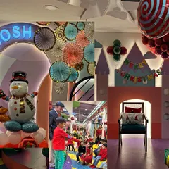 A look at our Christmas party stage, complete with a snowman and festive decor. We go all out to create a magical atmosphere for our holiday events.