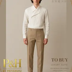 A showcase of refined casualwear. A model wears a bespoke off-white linen shirt with a unique, experimental wrap collar, paired with perfectly tailored beige trousers for a sophisticated look.