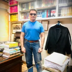 My chamber at the Delhi High Court is where the real work happens. Surrounded by law books and case files, I prepare every argument and piece of evidence meticulously. My coat is ready, a sign that court is always just a few steps away.