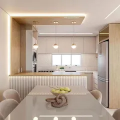 Another view of the open kitchen concept, showing the seamless integration of the dining area. The pendant lights and fluted paneling on the island add a touch of modern elegance, making it a perfect space for family meals and entertaining.