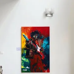 My Jimi Hendrix painting hanging in a gallery space. The clean white wall makes the vibrant colors of the 5x3 feet canvas pop, showing how it can serve as a powerful focal point.