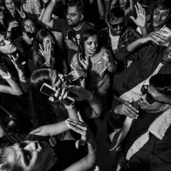 An overhead view of a packed dance floor, completely lost in the music. This is the goal for every event: to create a space where everyone feels free to dance and celebrate together.