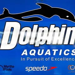The banner for Dolphin Aquatics. We are in the pursuit of excellence, supported by top brands like Speedo. This is our commitment to quality.