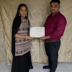 Another one of my students proudly holding her certificate. I make sure every student gets the personal attention they need to become a confident mehandi artist.