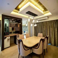 The fondest memories are made when gathered around the table. This luxurious dining area features a stunning onyx-like ceiling and a beautiful marble-top table.