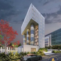 Illuminating innovation at Joy Tower, Noida. This modern commercial facade uses sleek metal and vibrant lighting to redefine the skyline with a touch of brilliance.