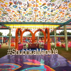 A fun carnival-themed Mehendi. The custom printed dance floor, colorful arches, and a unique hashtag sign create a playful and high-energy atmosphere perfect for celebrating.