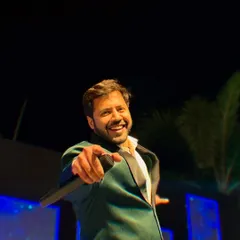Pointing right at the camera, inviting you to join the party. As a Sangeet host, my job is to make every single guest feel like they are the star of the show.