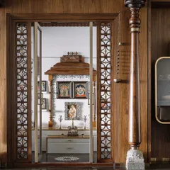 I believe a pooja room should be a sanctuary of peace. For this space, I drew inspiration from the grandeur of South Indian temples, using vintage pillars, custom jalli work, and a mantapa that echoes temple gopurams. It’s a celebration of tradition, crafted with intricate details to create a truly sacred heart for the home.
