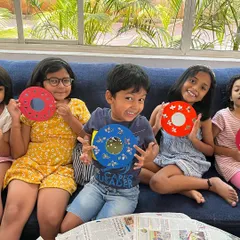 The best part of my workshops is the shared laughter and energy. Here's a happy group showing off the colourful mirror crafts they designed and decorated together during a weekend art class.