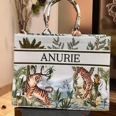 Carry the world in style with our suede velvet tote bags. This one features a bold tiger print and can be personalised with your name for a fierce and fashionable look.