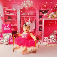 Posing in her own little Barbie world, this baby girl is surrounded by pink, glitter, and glamour. I love creating these elaborate, immersive sets.