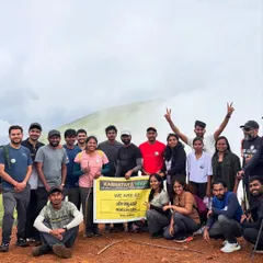Our happy group at the summit of Netravathi Peak, holding our banner high. We celebrate every achievement together as a team.