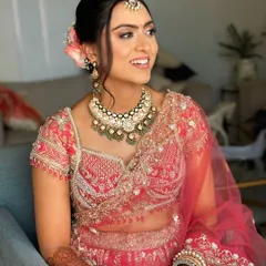 The updo is designed to be comfortable and secure, ensuring the bride looks flawless throughout her wedding ceremony.