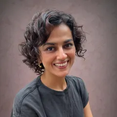 A new cut and color should make you feel amazing. Here is Shraddha looking radiant after I refreshed her curly bob with subtle Pintura highlights to add dimension and life to her natural texture.