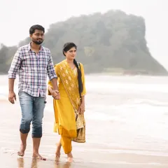 Hand in hand, walking along the shore. A pre-wedding shoot is the perfect time to create these timeless, romantic images.