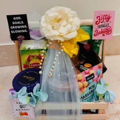 We believe every detail counts, from the big white peony on top to the arrangement of snacks, this birthday hamper is designed to delight.