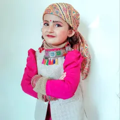 A proud "Pahadan" look for this kids portrait. Dressing up in traditional Himachali attire adds a beautiful cultural element to children's photography.