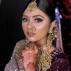 A detailed close-up of a modern bridal look, showcasing the precision in the eye makeup and the smooth, airbrushed-like skin finish that you will learn to create.