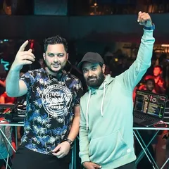 Posing with another DJ during a packed Saturday night. The DJ community in Bangalore is vibrant, and I love working with other artists to create memorable events.