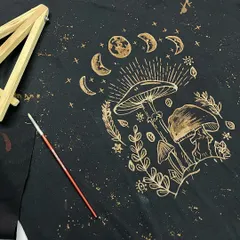 Can you believe this is not printed but hand-painted with bleach? This is a student's incredible work from one of my bleach art workshops, featuring mushrooms and moon phases.